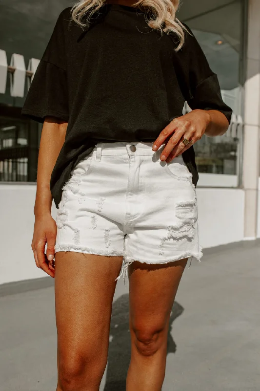 EVALINE DISTRESSED HIGH RISE DENIM SHORTS